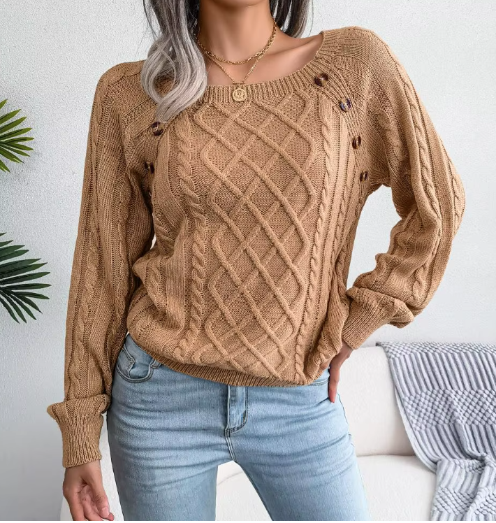 Maglione caldo lavorato a trecce