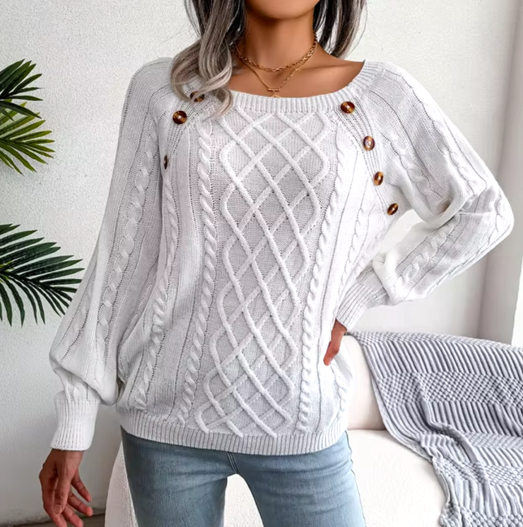 Maglione caldo lavorato a trecce