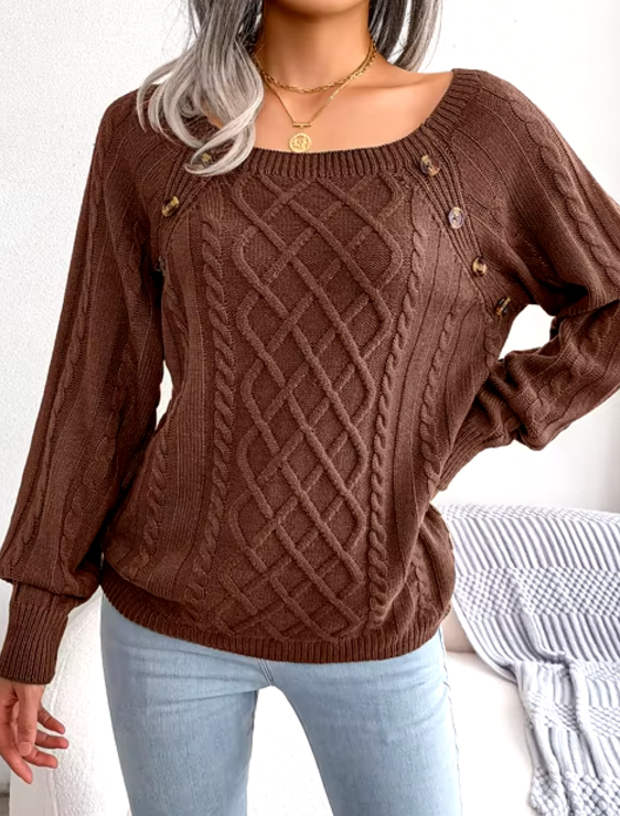 Maglione caldo lavorato a trecce