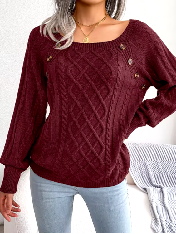 Maglione caldo lavorato a trecce
