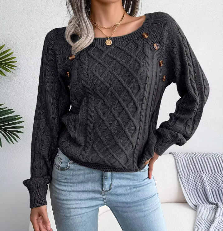 Maglione caldo lavorato a trecce